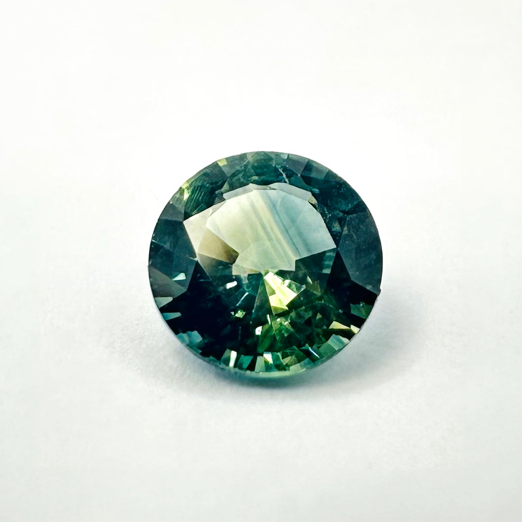 0.60cts 5mm Round Faceted Bi-Colour Teal-Blue Sapphire