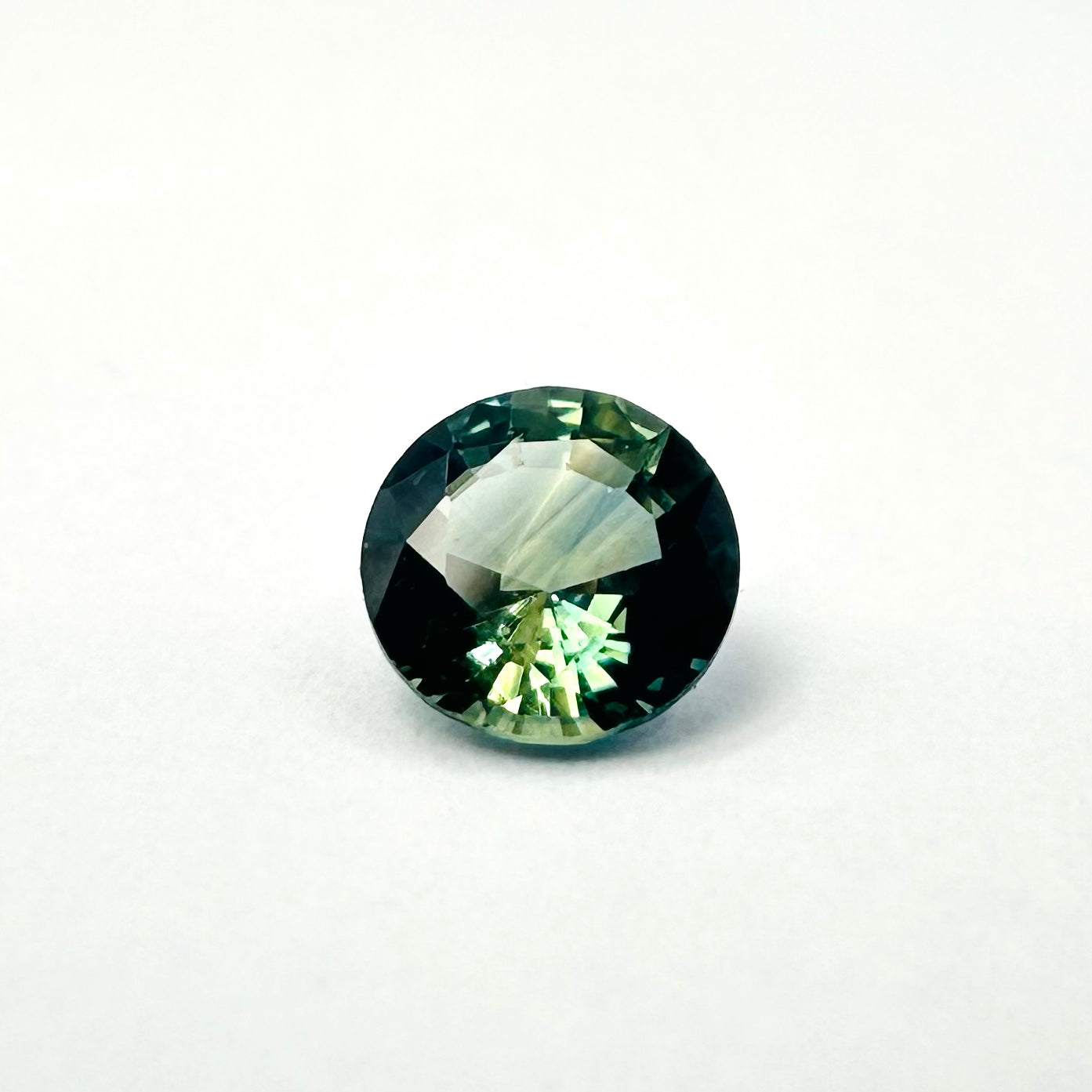0.60cts 5mm Round Faceted Bi-Colour Teal-Blue Sapphire