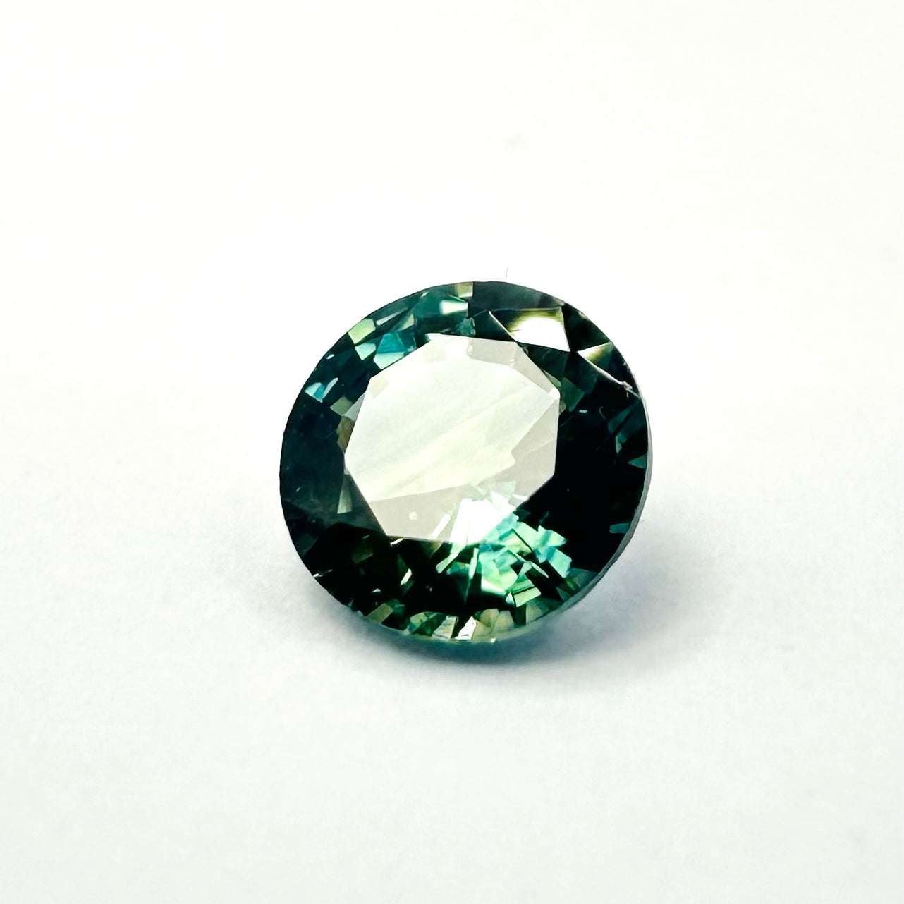 0.60cts 5mm Round Faceted Bi-Colour Teal-Blue Sapphire