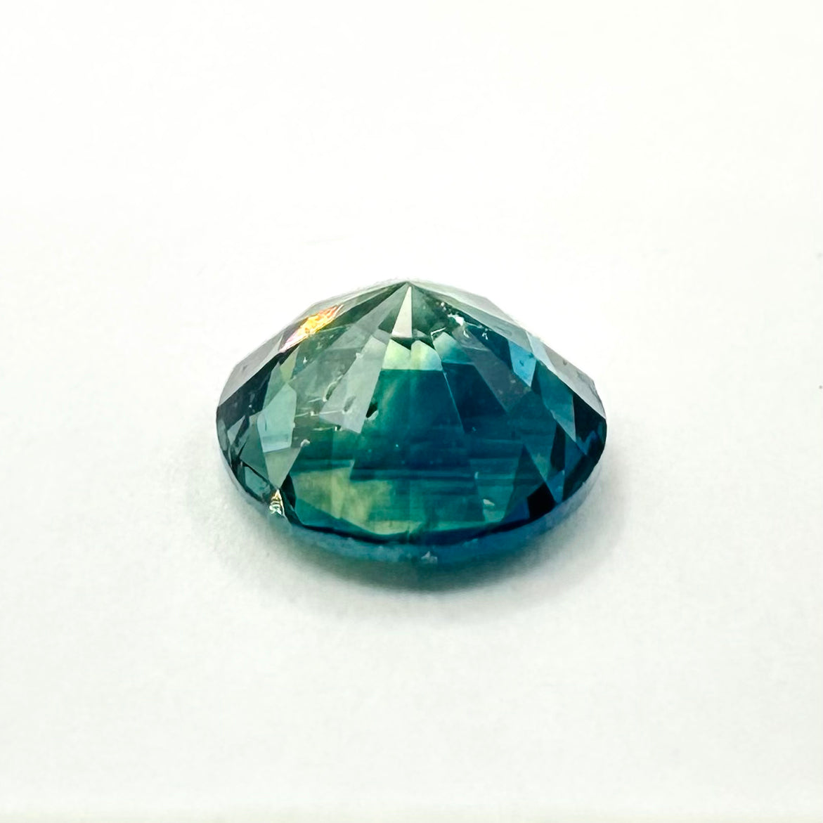 0.60cts 5mm Round Faceted Bi-Colour Teal-Blue Sapphire