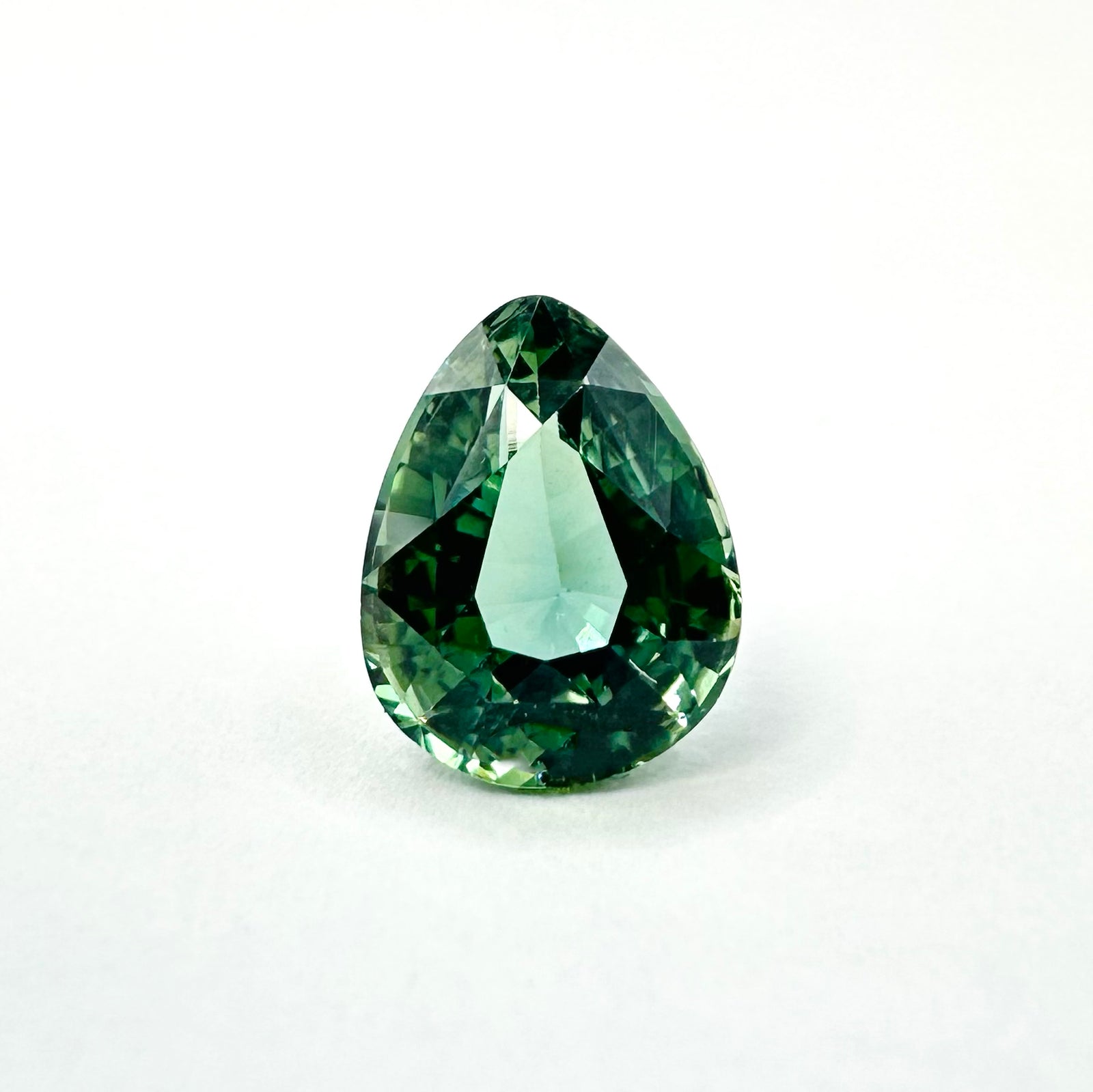 1.25cts 7x5.5mm Pear Shaped Faceted Teal-Green Sapphire