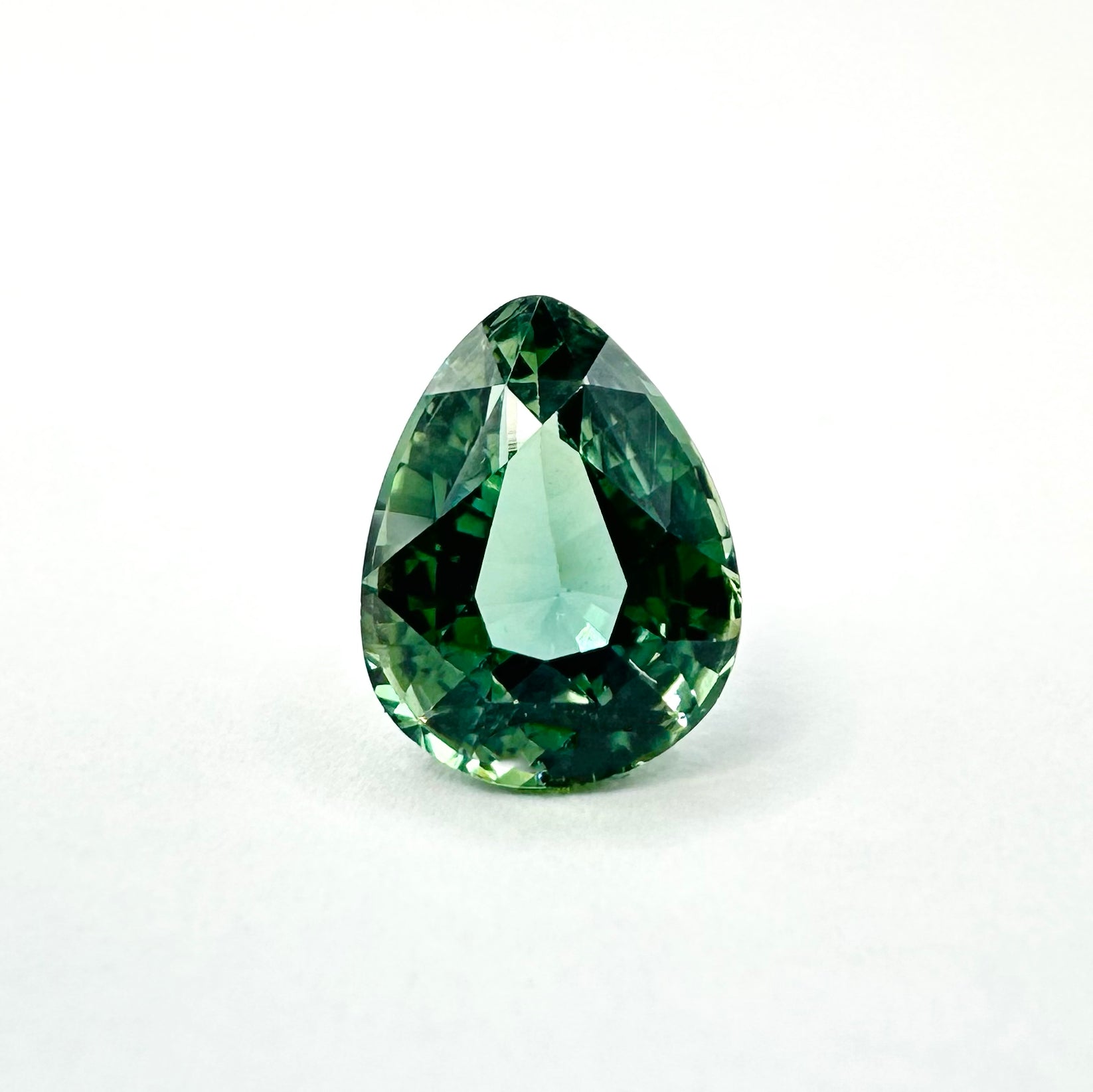 1.25cts 7x5.5mm Pear Shaped Faceted Teal-Green Sapphire