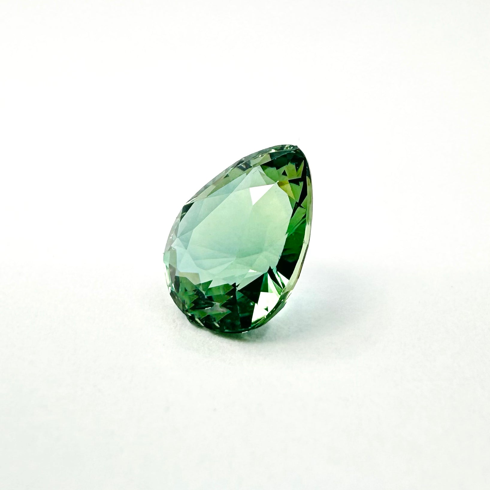 1.25cts 7x5.5mm Pear Shaped Faceted Teal-Green Sapphire