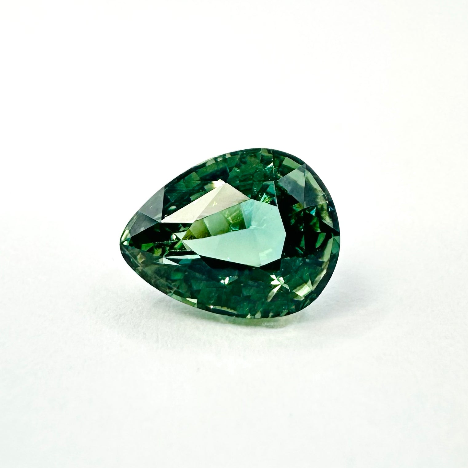 1.25cts 7x5.5mm Pear Shaped Faceted Teal-Green Sapphire