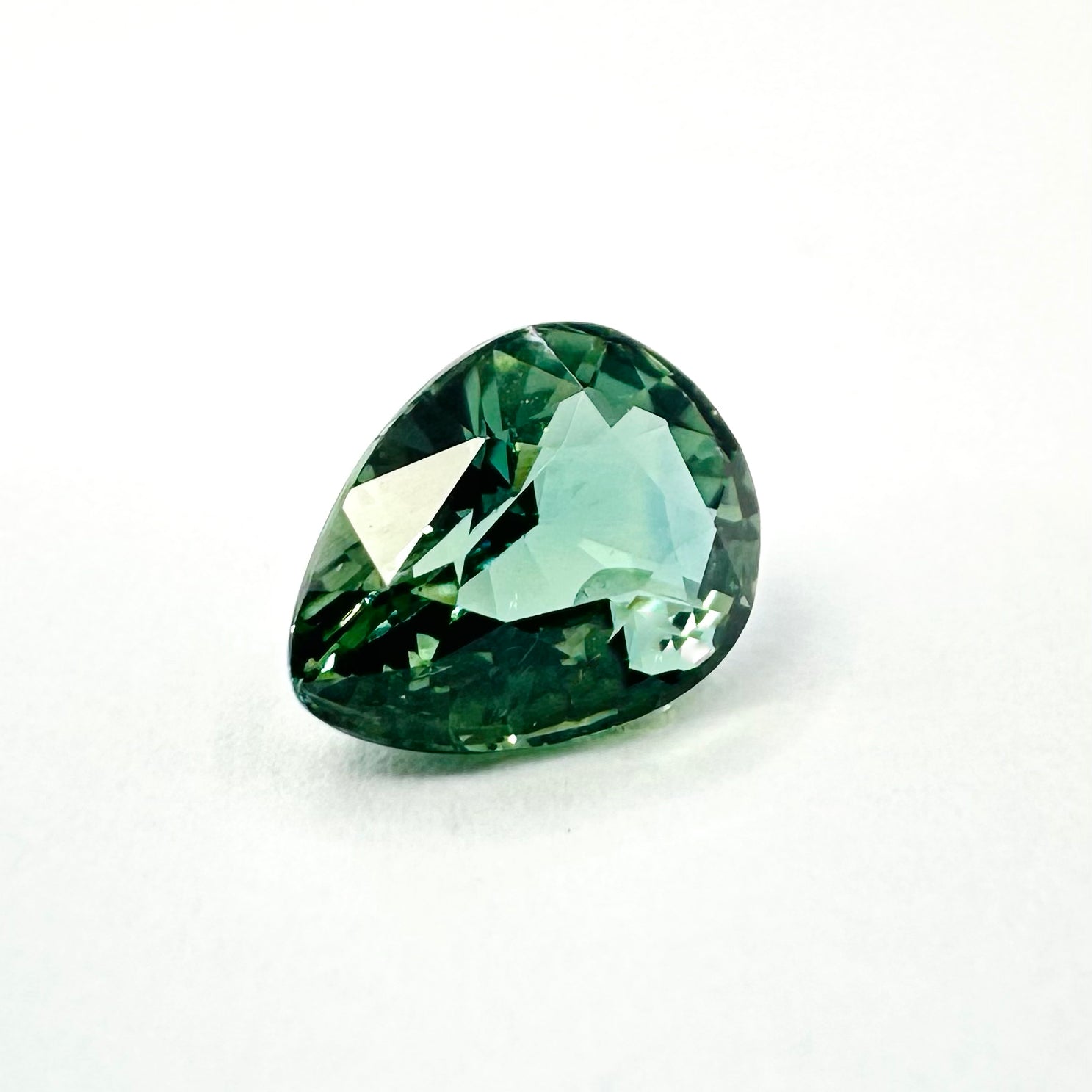 1.25cts 7x5.5mm Pear Shaped Faceted Teal-Green Sapphire