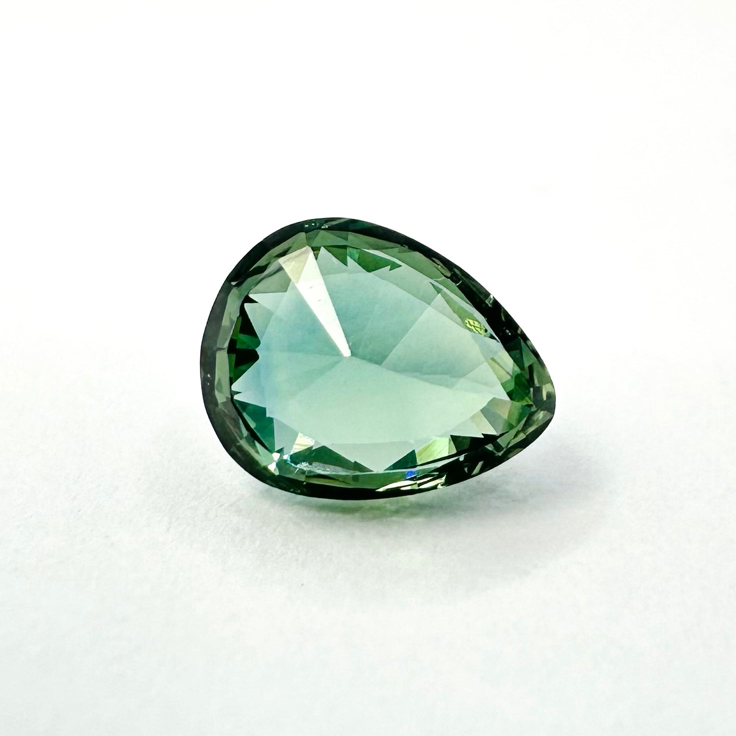 1.25cts 7x5.5mm Pear Shaped Faceted Teal-Green Sapphire