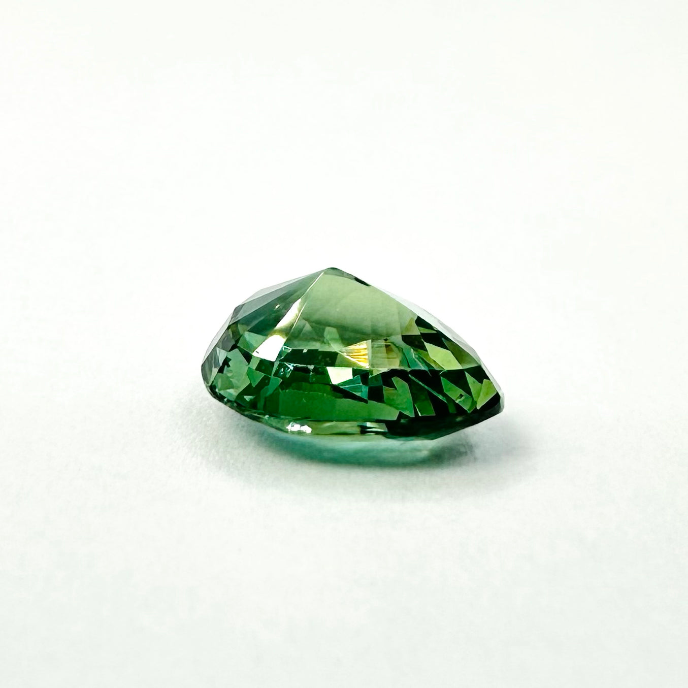 1.25cts 7x5.5mm Pear Shaped Faceted Teal-Green Sapphire