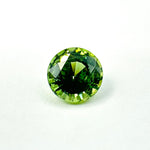 0.79cts 5.4mm Round Faceted Green Sapphire