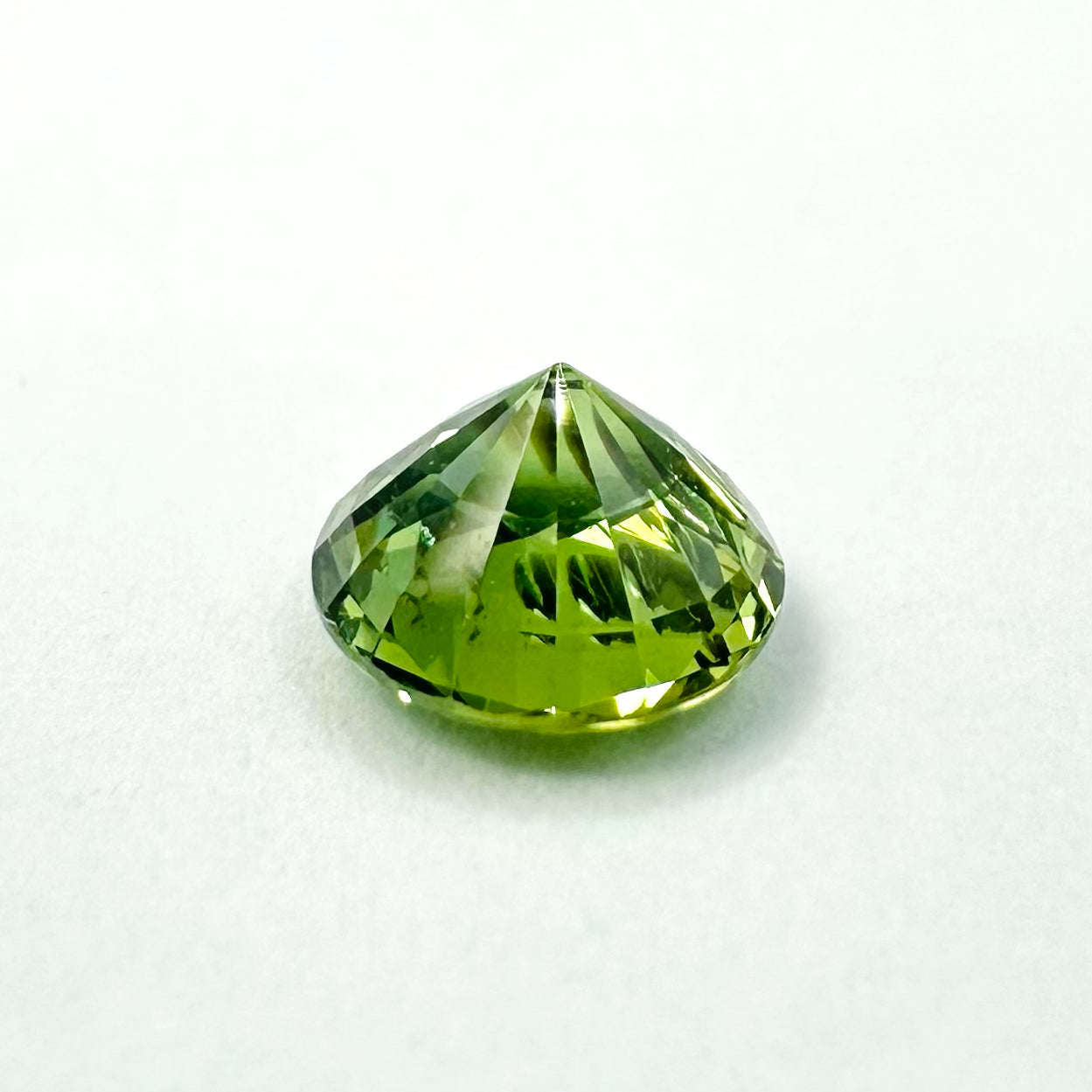 0.79cts 5.4mm Round Faceted Green Sapphire