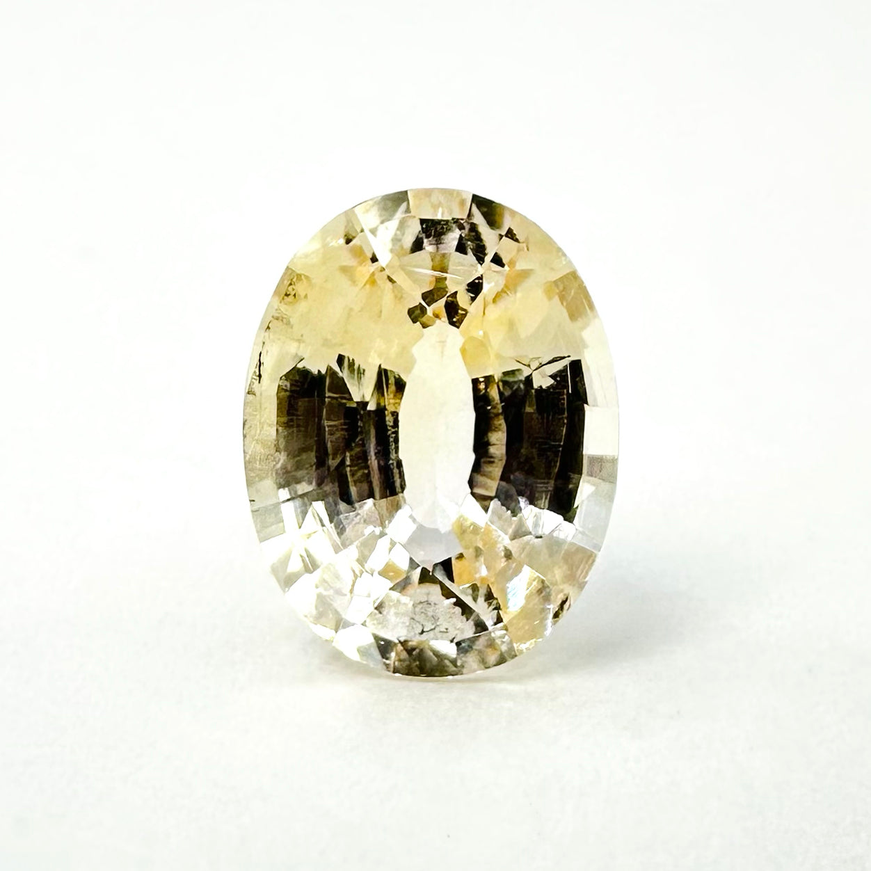 1.61cts 8x6mm Oval Faceted Peach-Champagne Sapphire