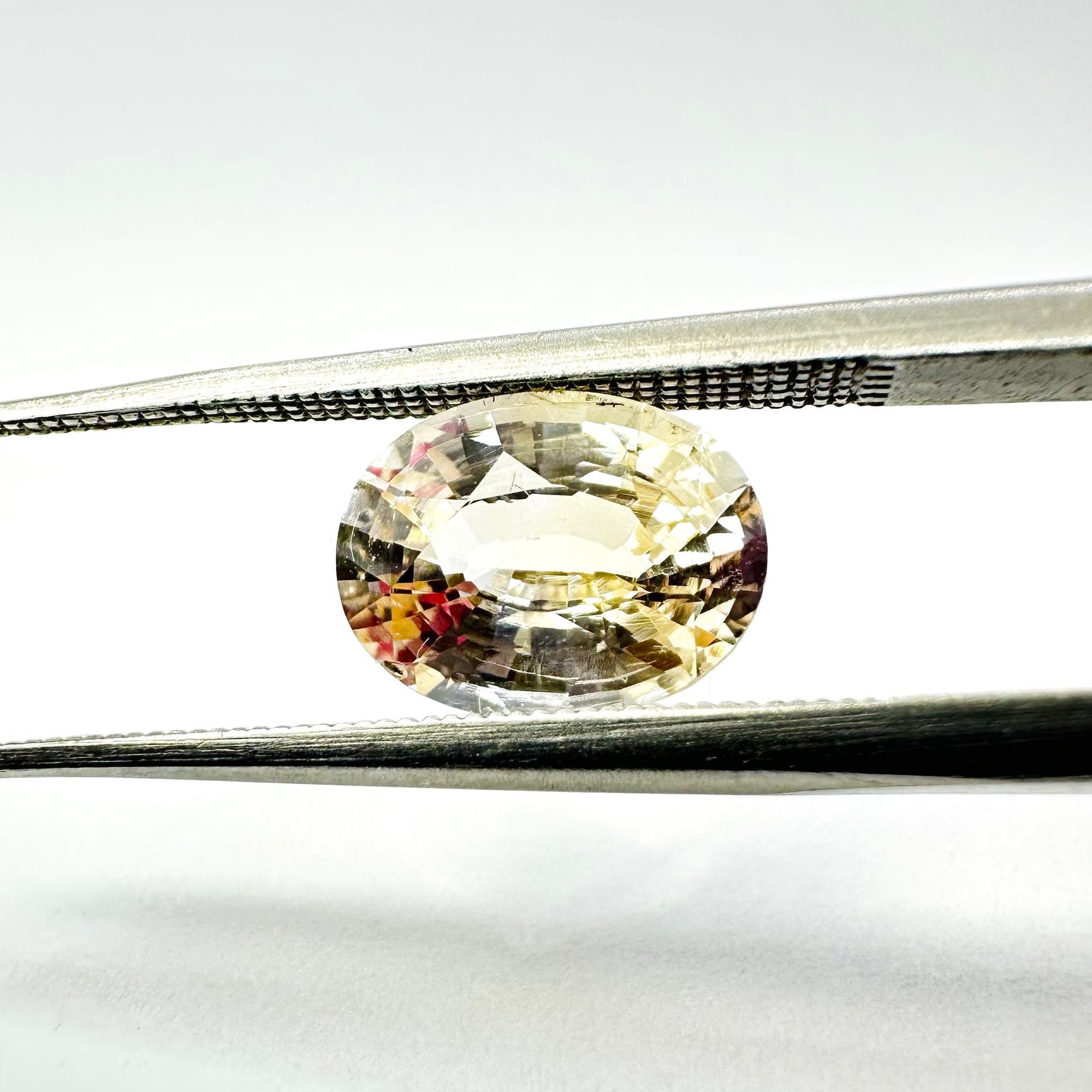 1.61cts 8x6mm Oval Faceted Peach-Champagne Sapphire