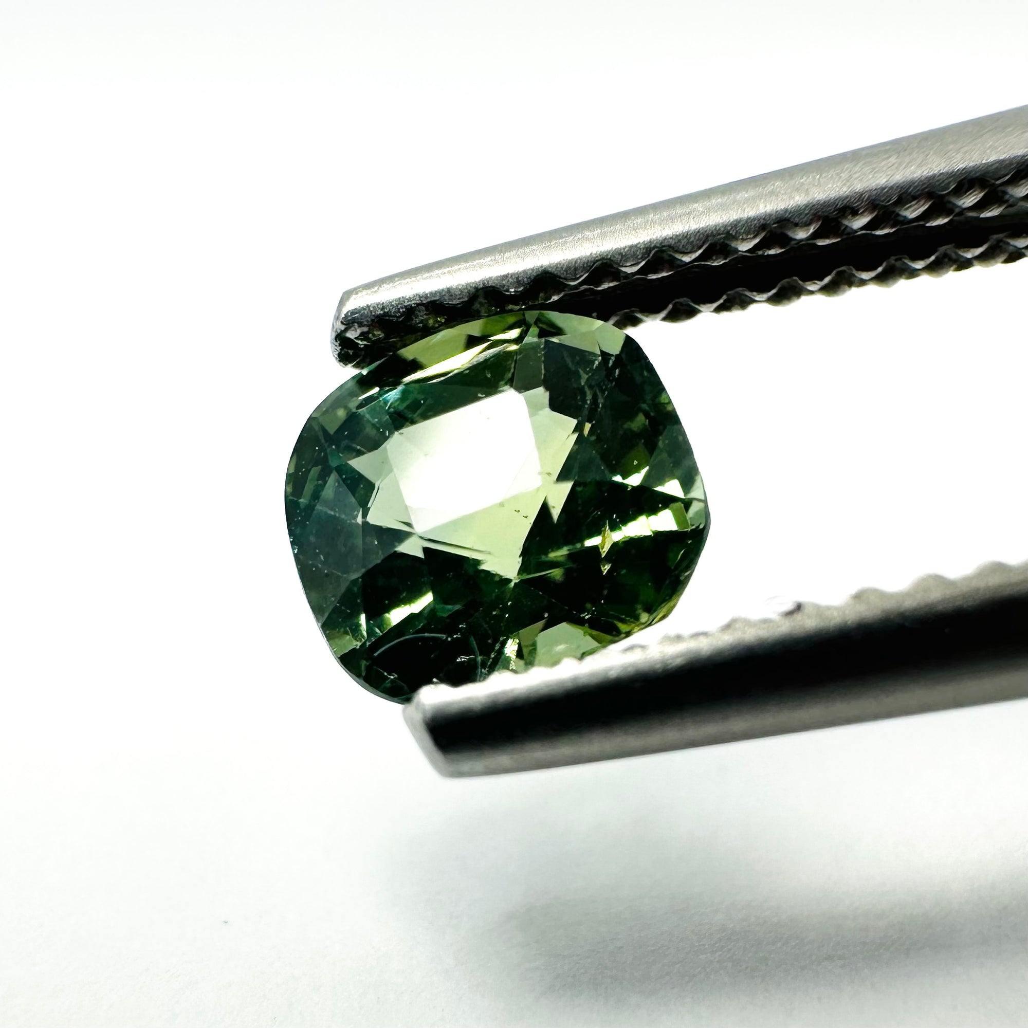 1.05cts 5.7x5.5mm Cushion Shaped Green Sapphire