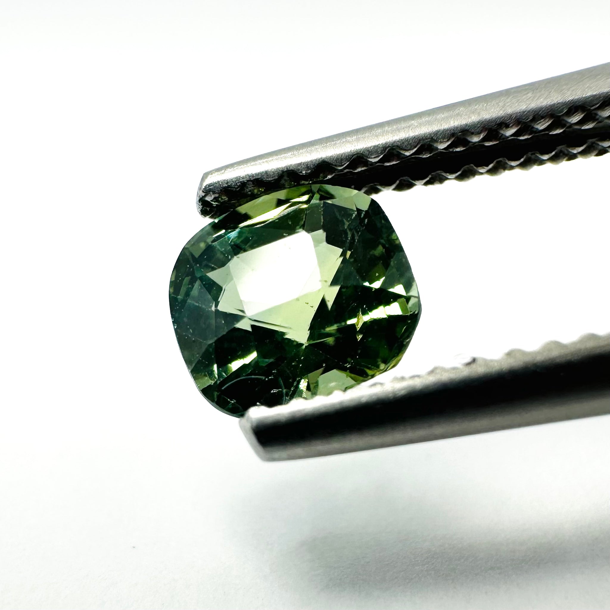 1.05cts 5.7x5.5mm Cushion Shaped Green Sapphire