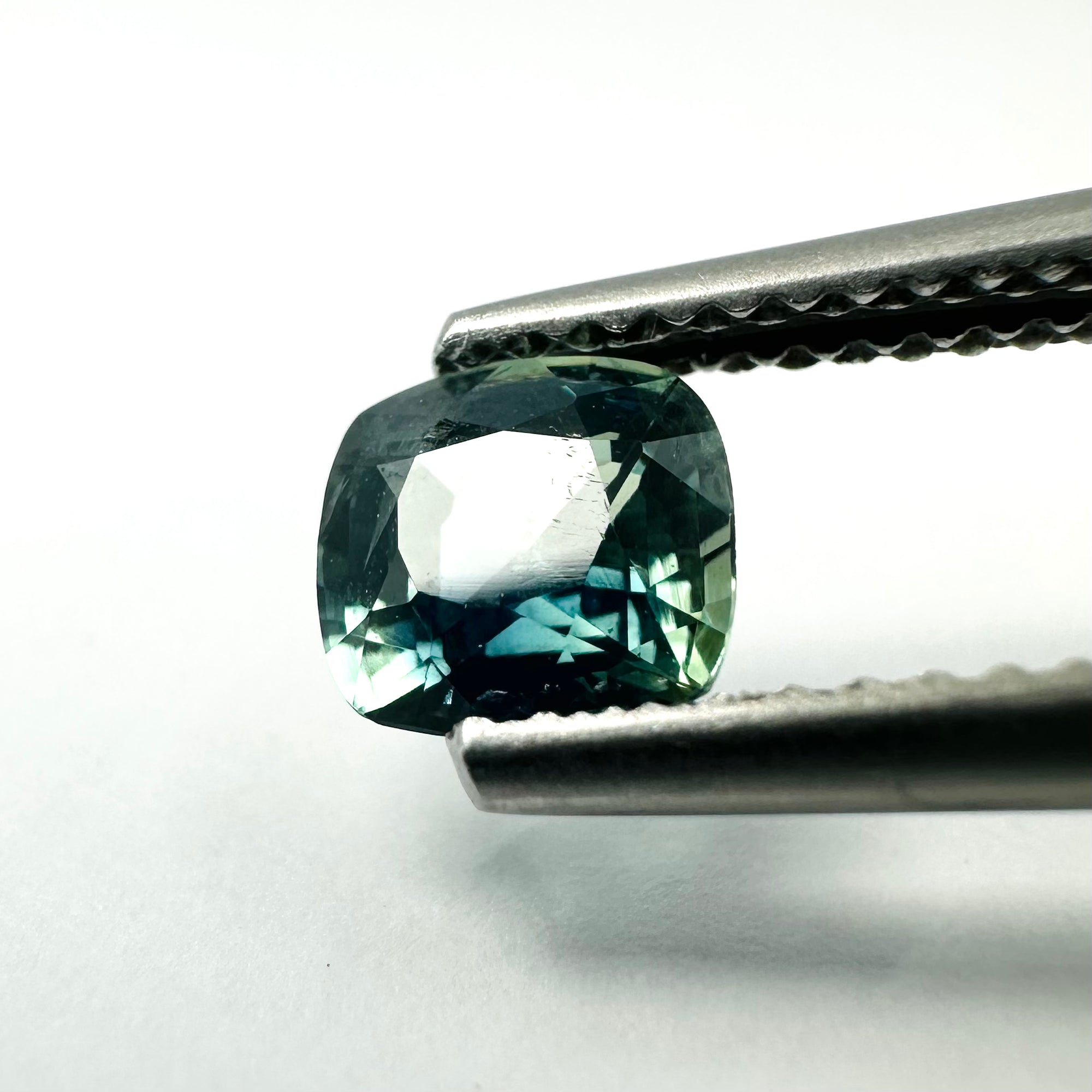 0.93cts 5.75x5.5mm Cushion Blue-Teal Sapphire