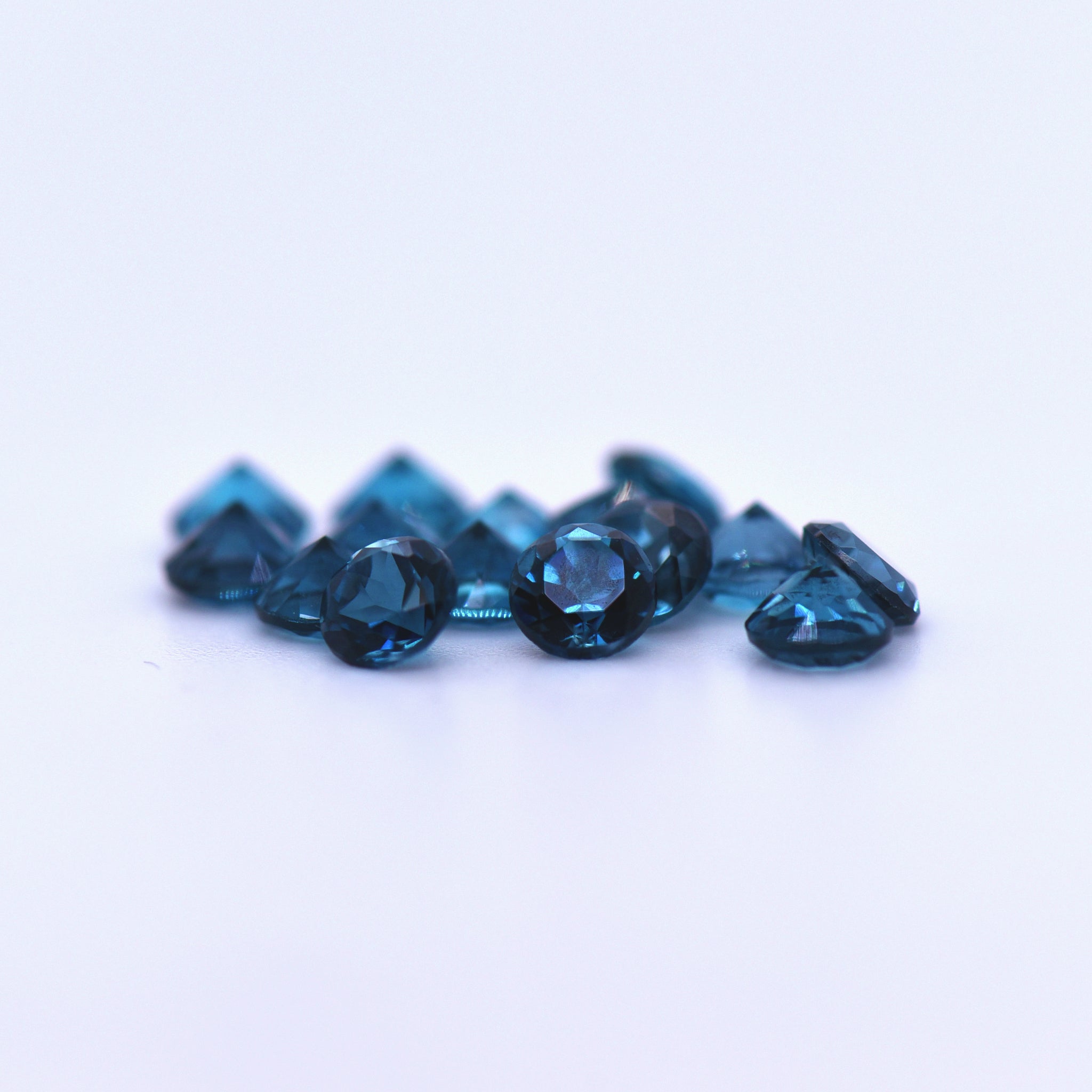4.25mm Round Faceted London Blue Topaz
