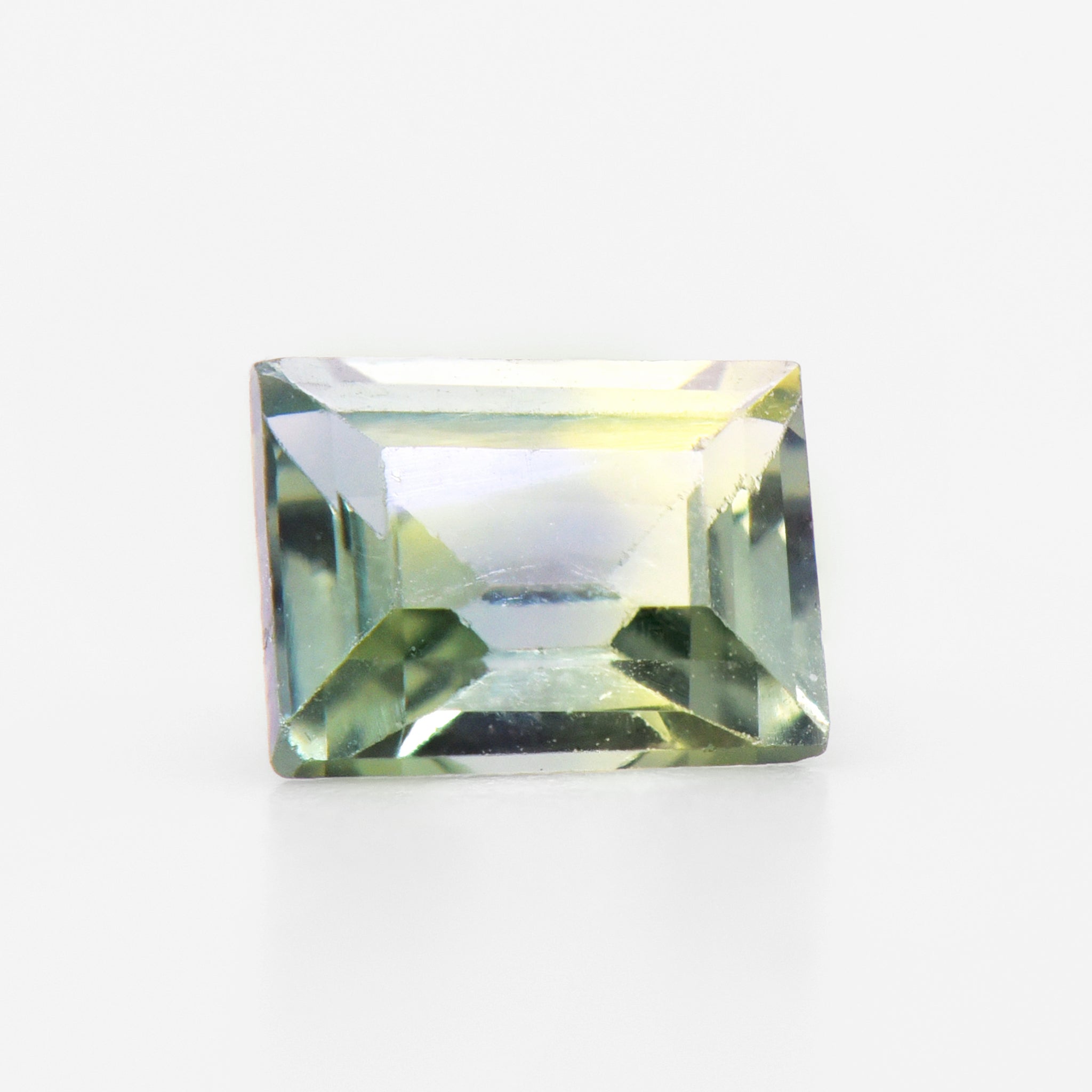 0.90cts 6x4.7mm Baguette Step Cut Bi-Coloured Teal Sapphire