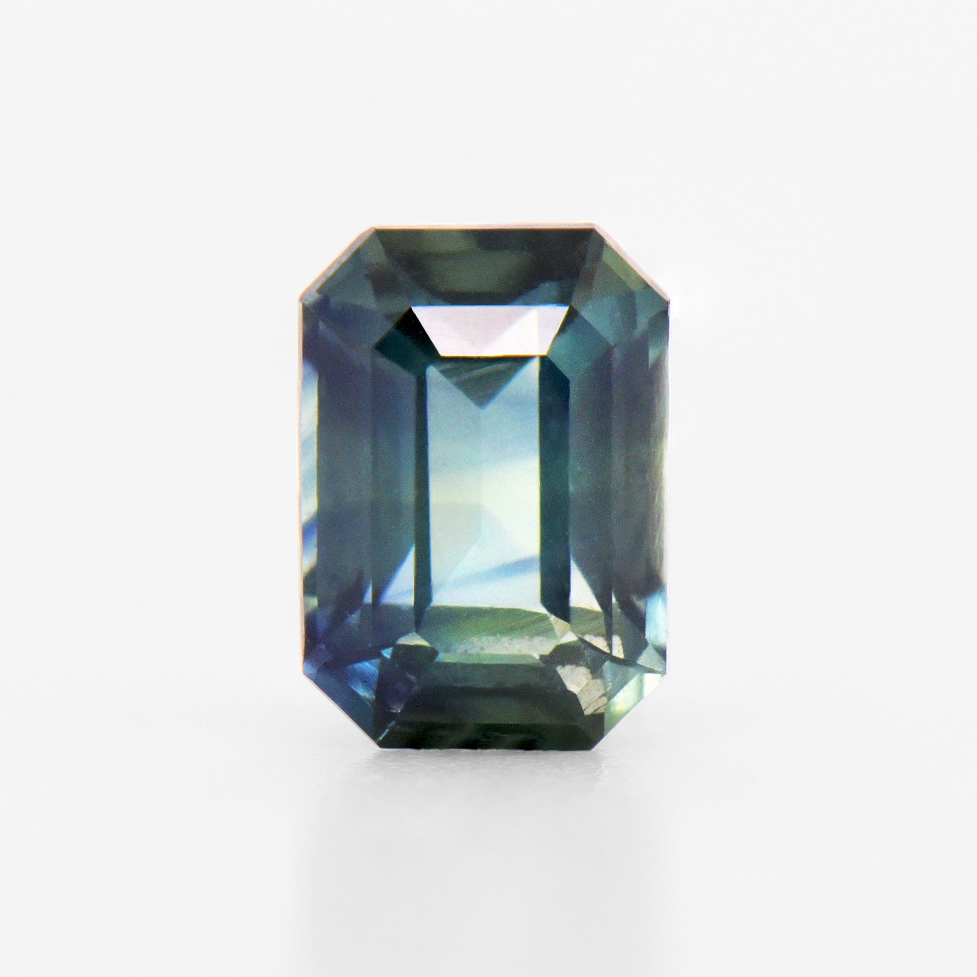 0.90cts 6.3x4.5mm Octagonal Faceted Bi-Colour Teal Sapphire