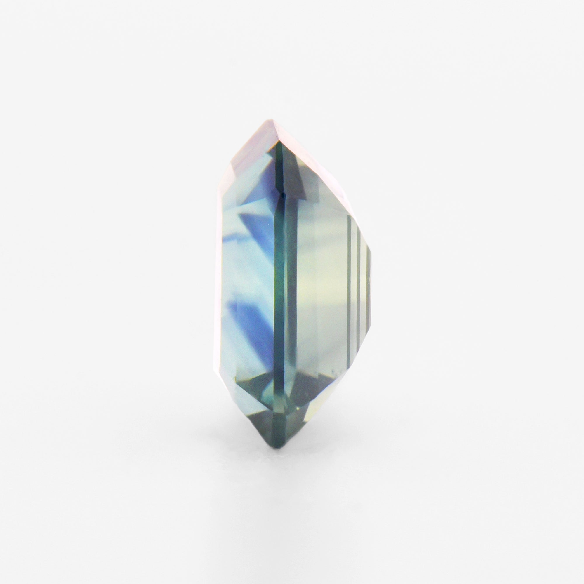 0.90cts 6.3x4.5mm Octagonal Faceted Bi-Colour Teal Sapphire
