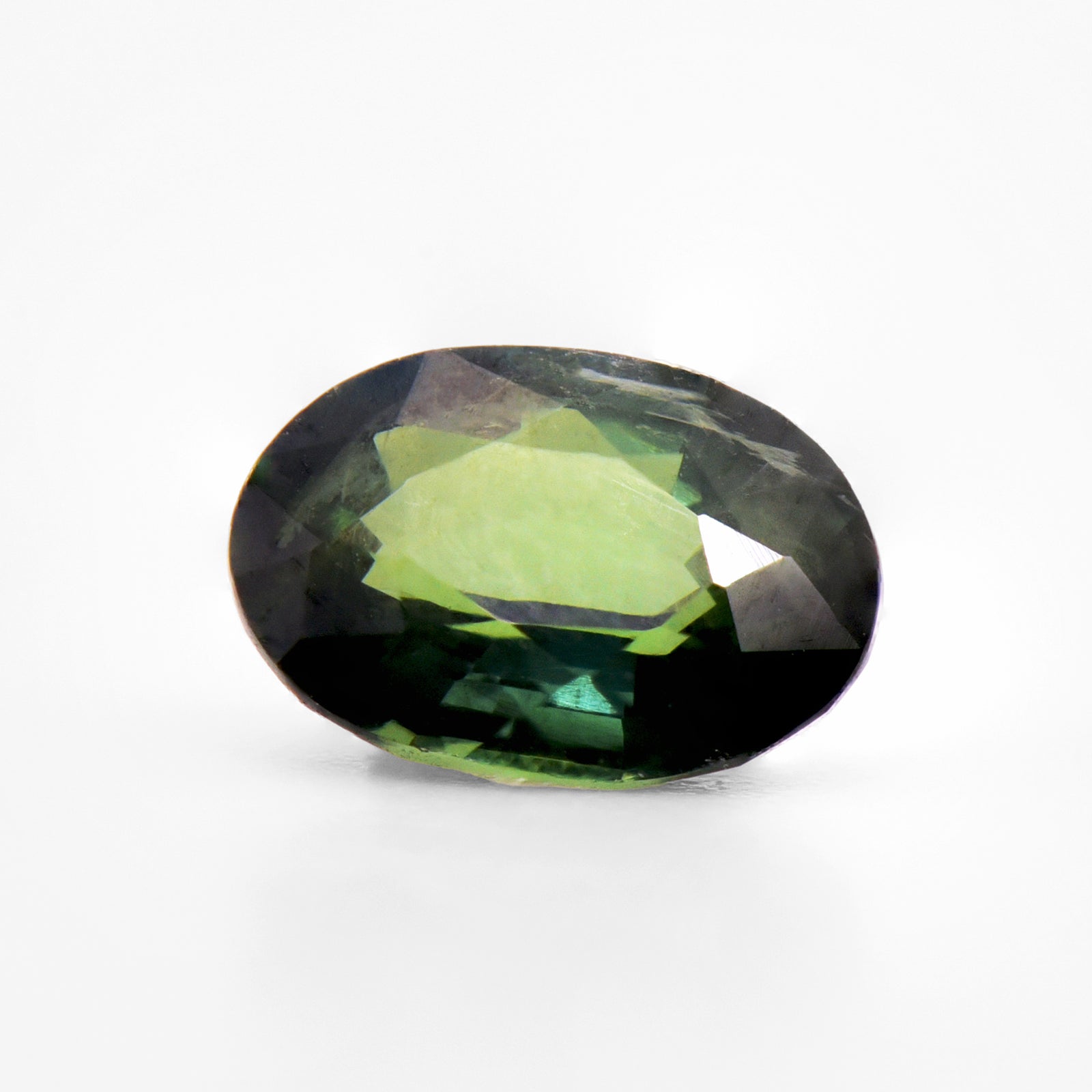 1.04cts 7.2x5.3mm Oval Faceted Green Sapphire