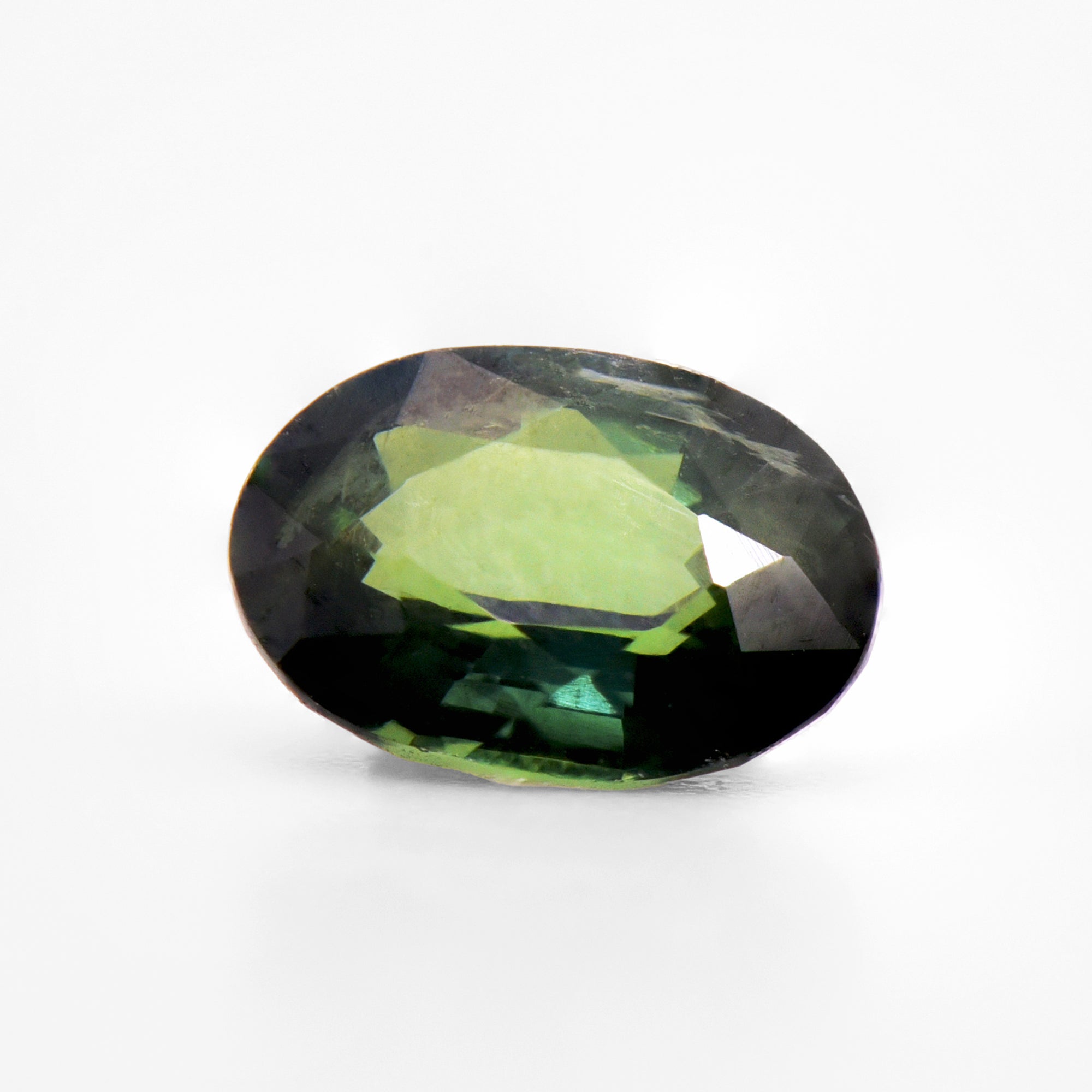 1.04cts 7.2x5.3mm Oval Faceted Green Sapphire