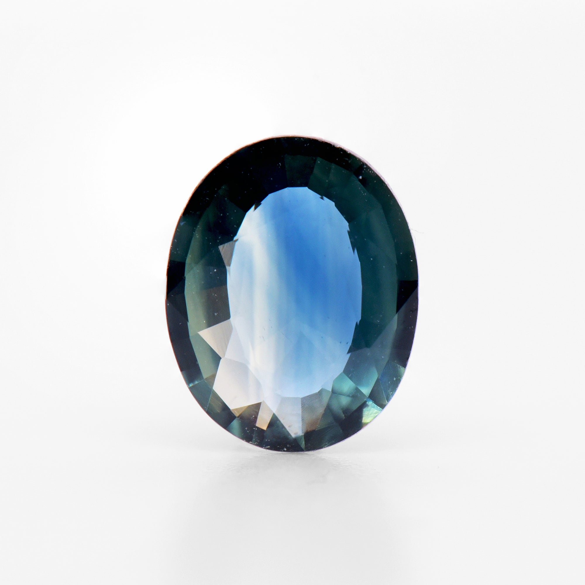 1.18cts 8.1x6.4mm Oval Faceted Bi-Colour Blue Sapphire