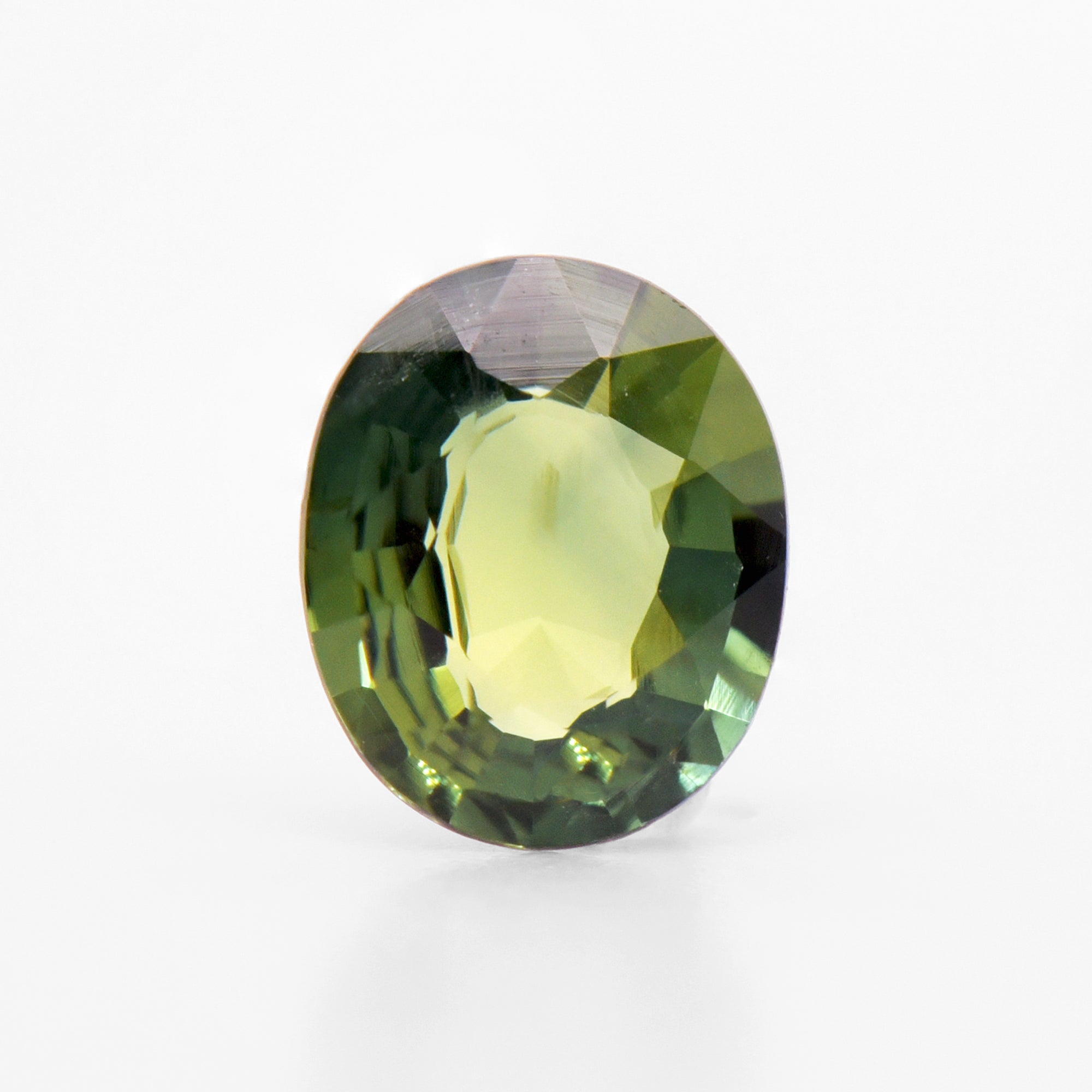 0.66cts 6.2x5.1mm Oval Faceted Green Sapphire