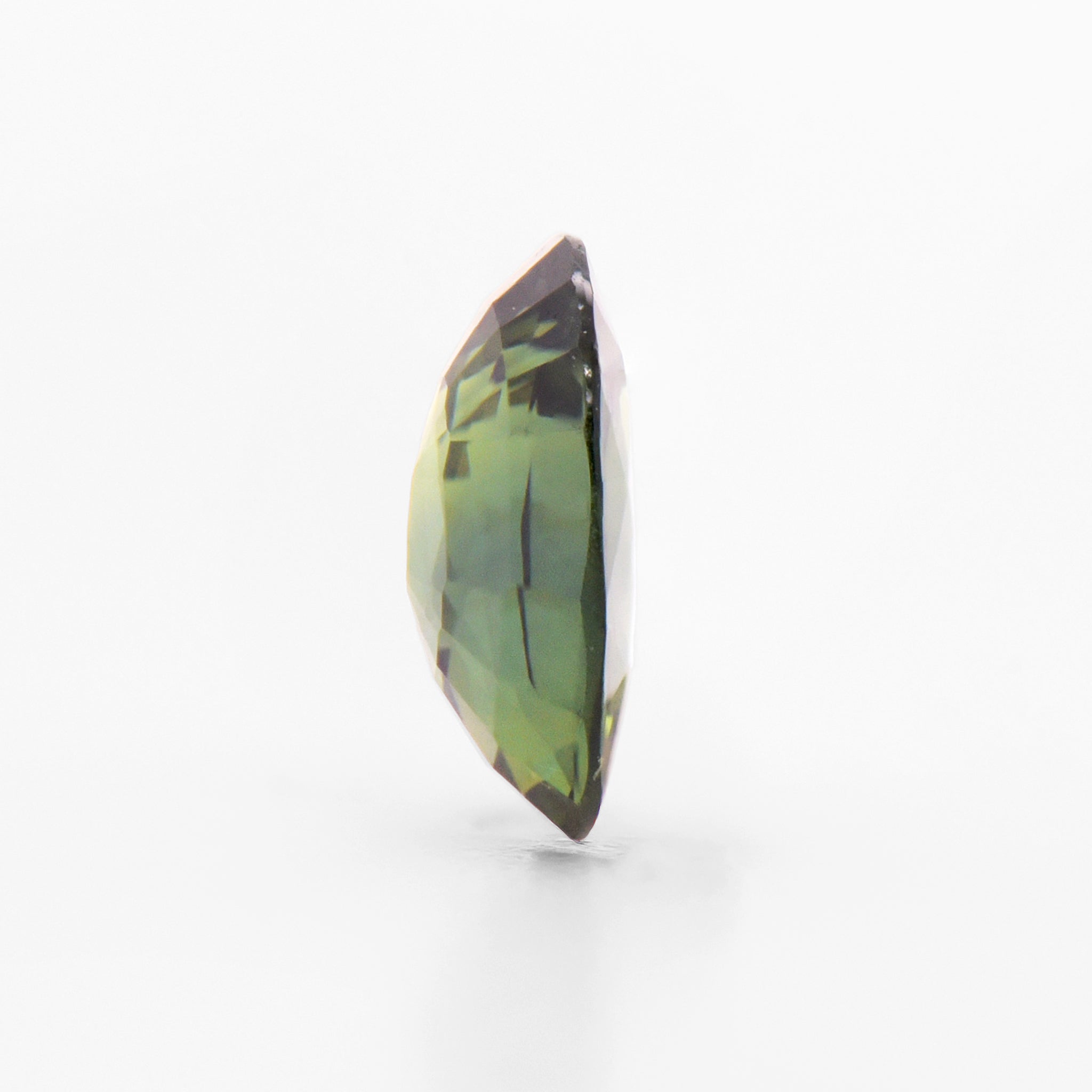 0.66cts 6.2x5.1mm Oval Faceted Green Sapphire