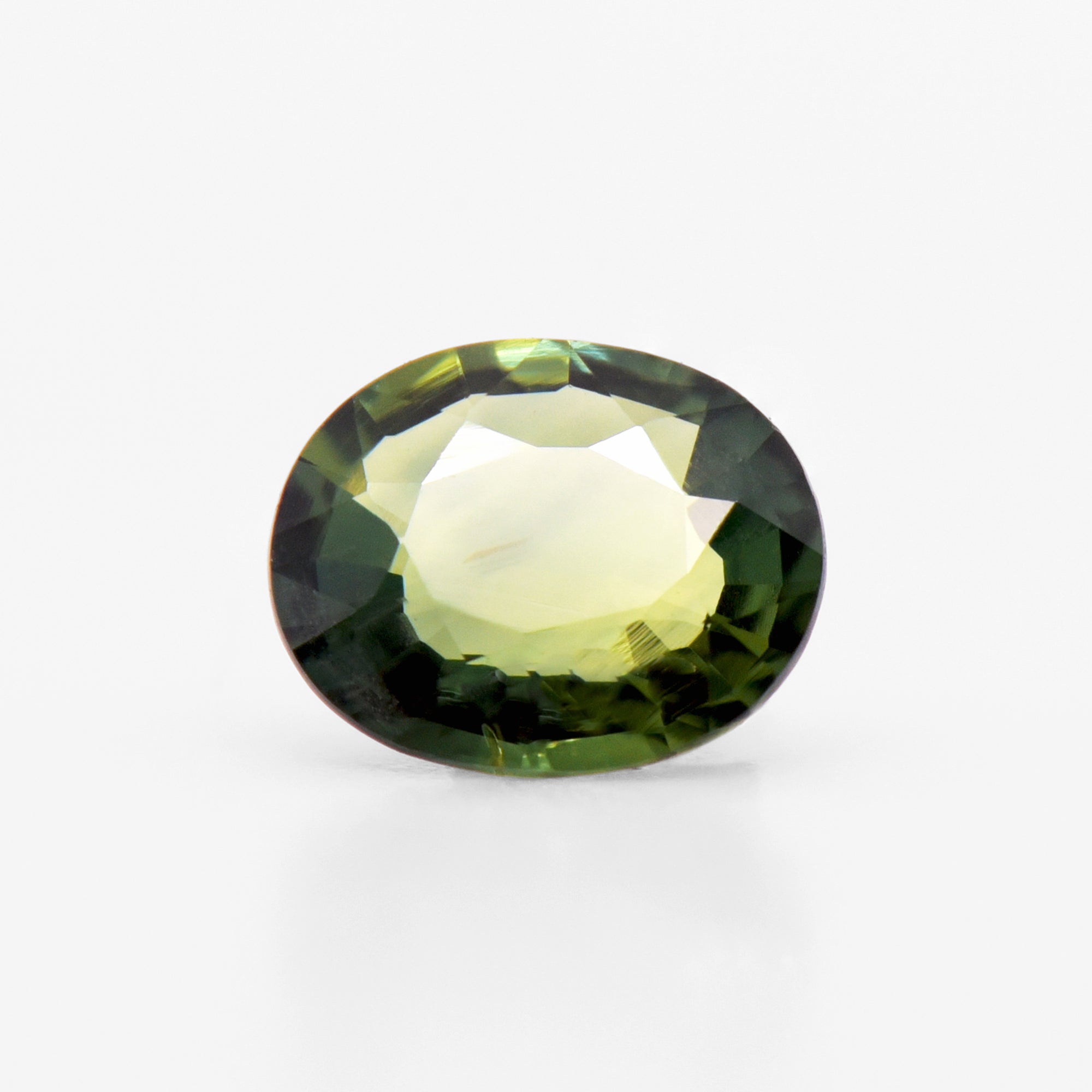 0.66cts 6.2x5.1mm Oval Faceted Green Sapphire