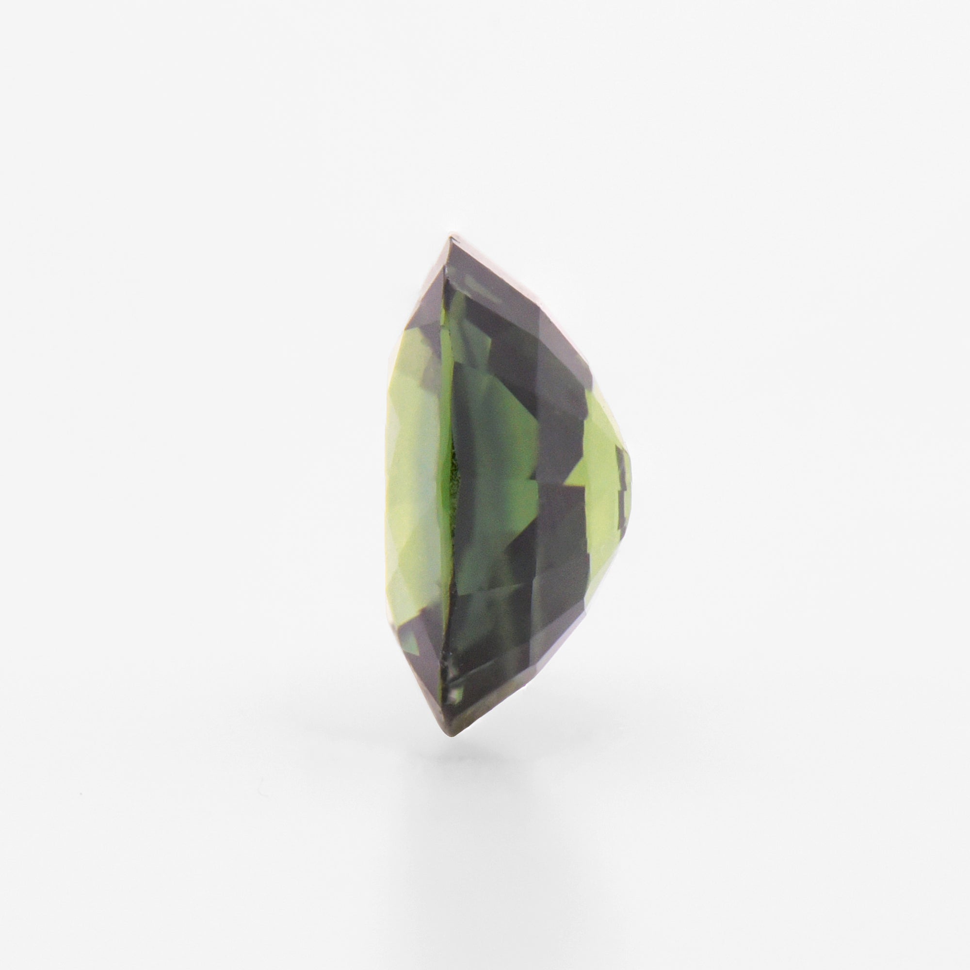 0.76cts 6x5mm Oval Faceted Green Sapphire