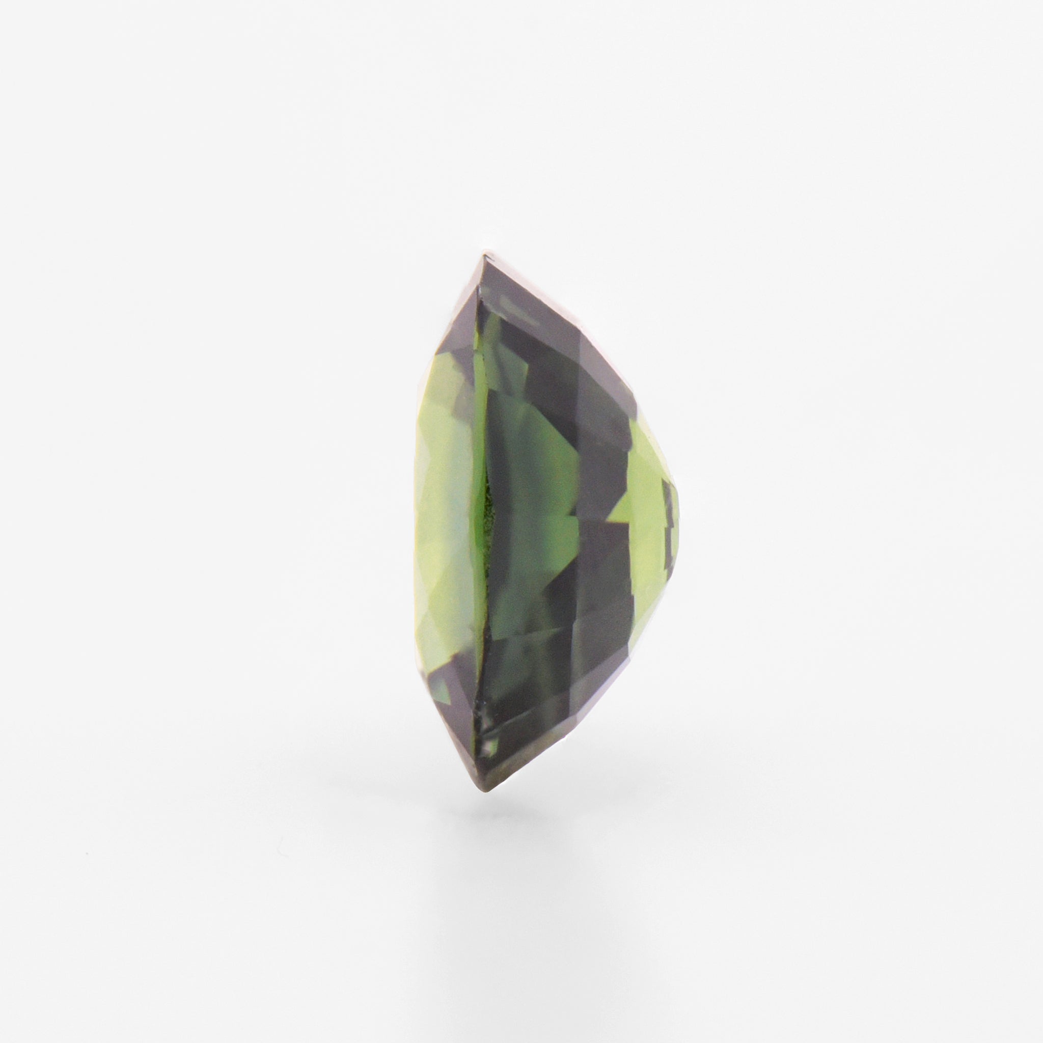 0.76cts 6x5mm Oval Faceted Green Sapphire