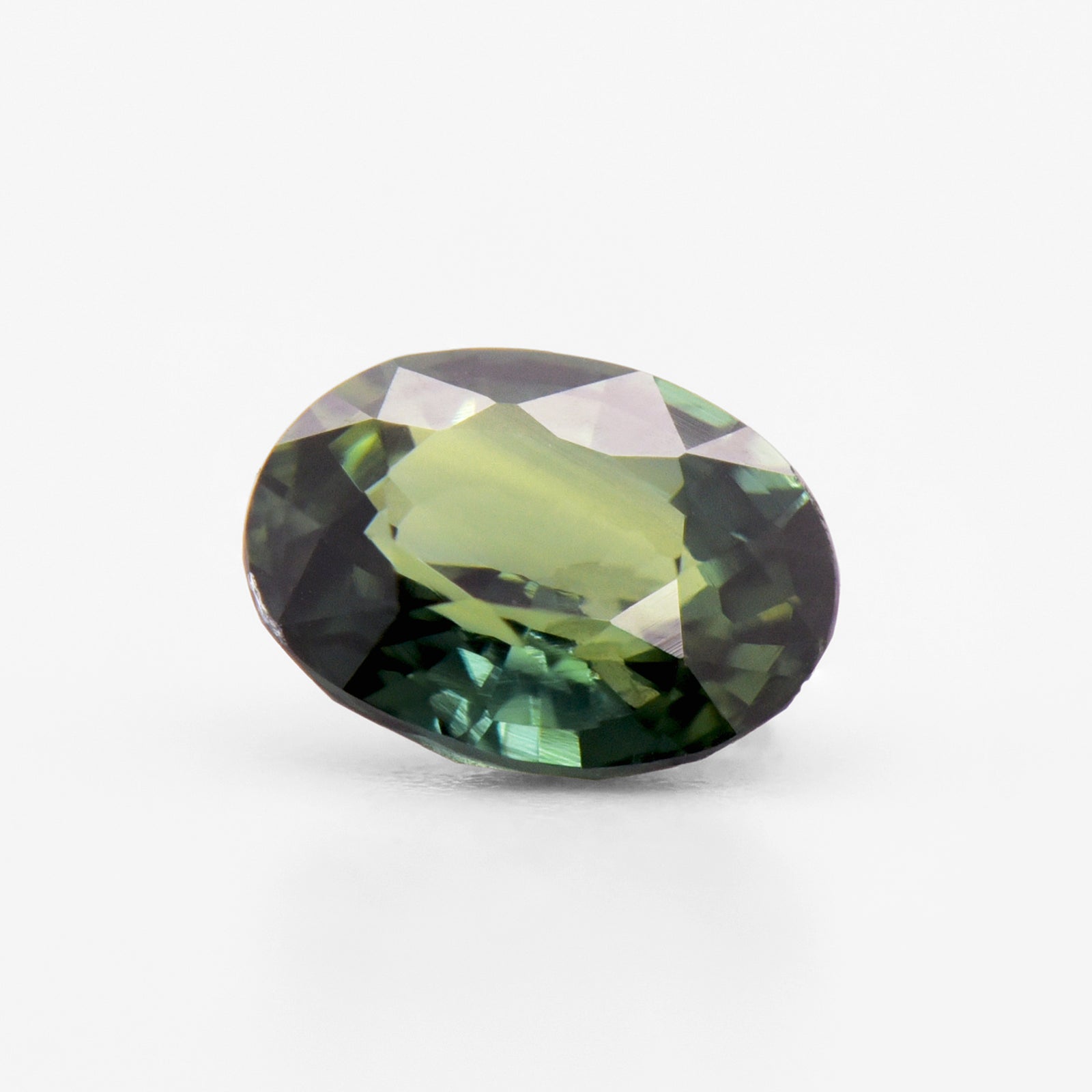 0.76cts 6x5mm Oval Faceted Green Sapphire