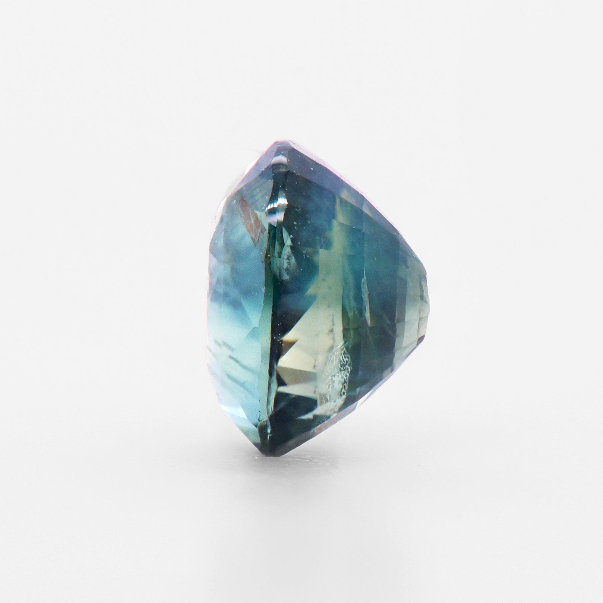 1.65cts 7x5.7mm Oval Faceted Teal Sapphire