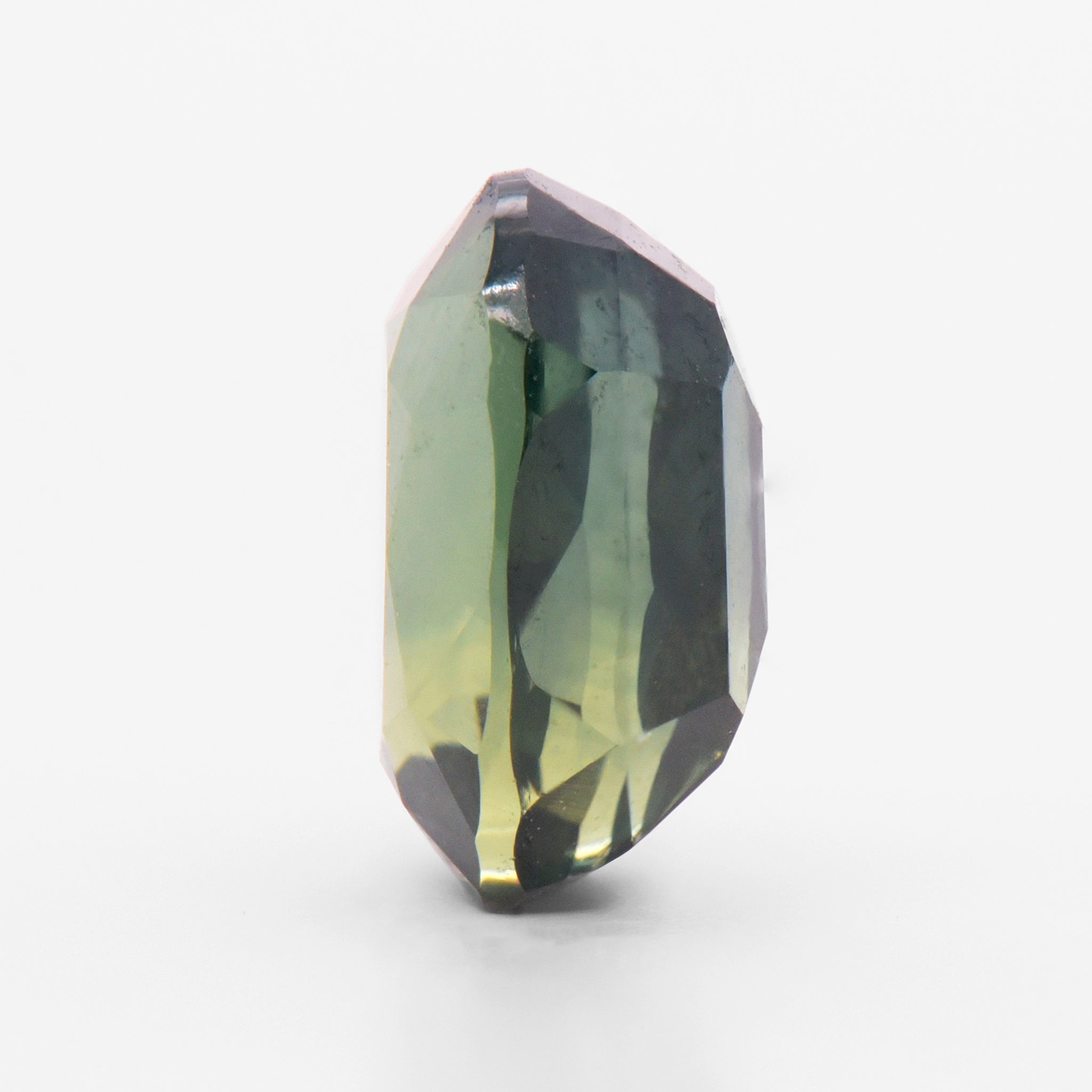1.98cts 8.2x5.6mm Oval Faceted Green Sapphire