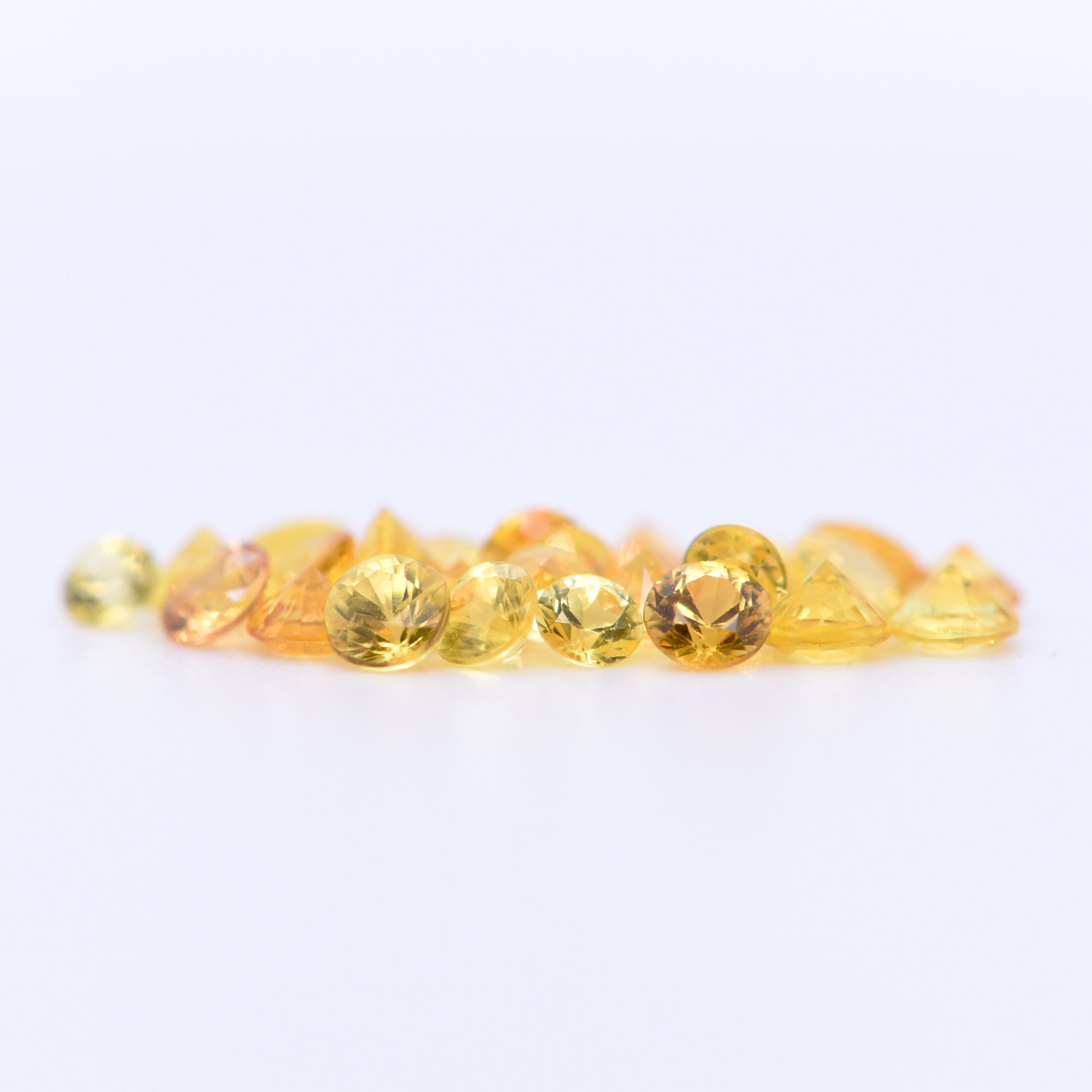 2.5mm Round Faceted Yellow Sapphires