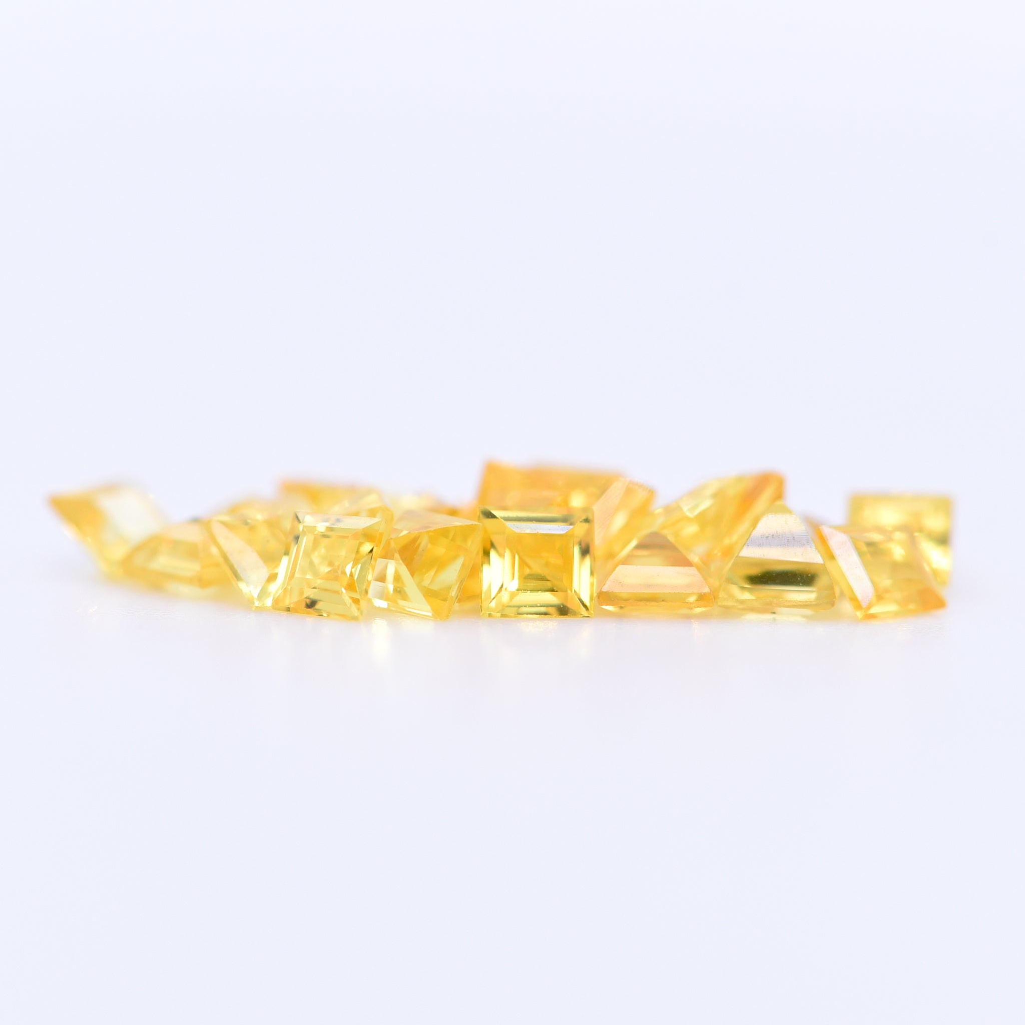 2.5x2.5 Square Step Cut Yellow Sapphires